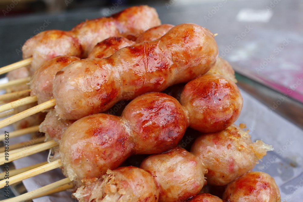 Deep fried sausages of fermented pork and glutinous rice northeastern Sai Krok Isaan Thai food Deep fried sausages of fermented pork and glutinous rice northeastern Sai Krok Isaan Thai food