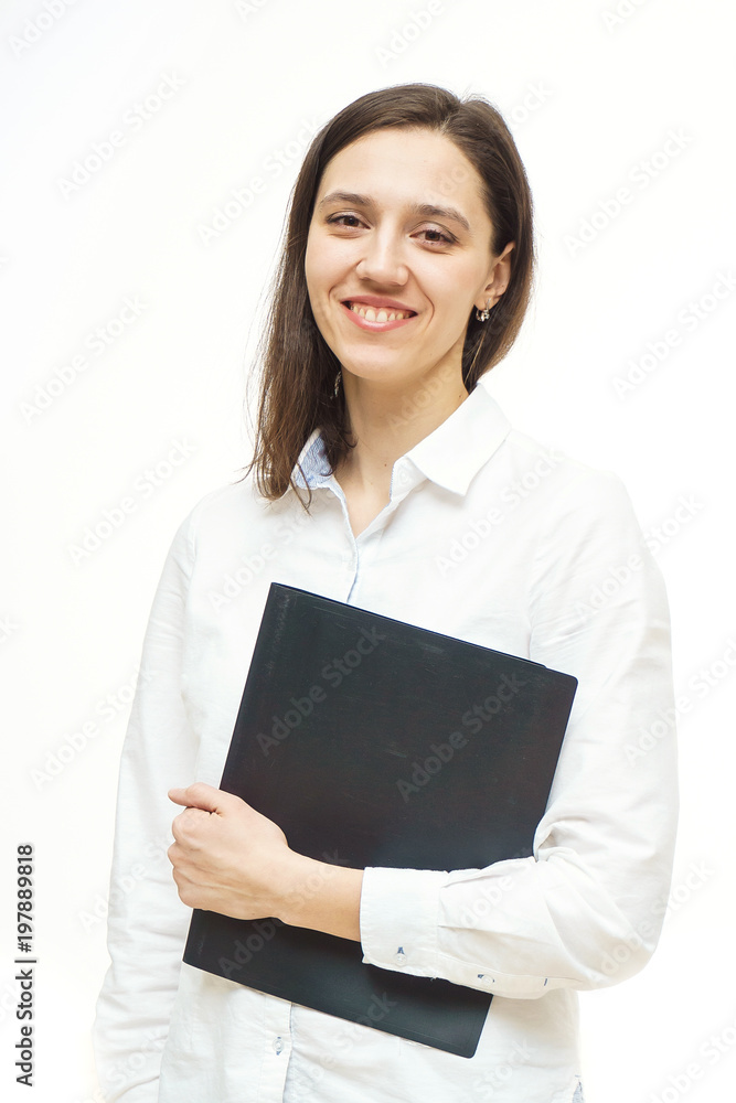 beautiful businesswoman standing with folder in studio on the white background beautiful businesswoman standing with folder in studio on the white background