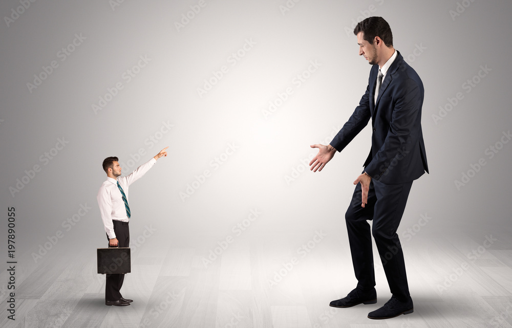 Small businessman in shirt pointing to an afraid businessman
Small businessman in shirt pointing to an afraid businessman