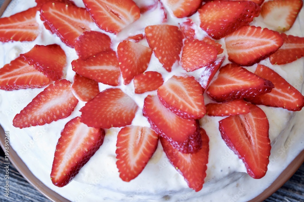 Delicious cake with fresh strawberries and cream Delicious cake with fresh strawberries and cream