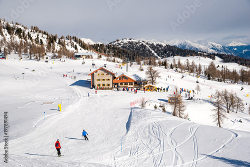Sunny day in a winter resort in the Alps