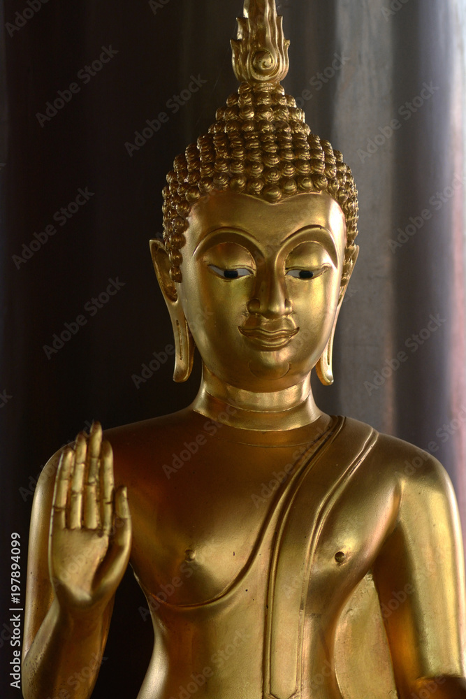 Golden of buddish state in the art style ,Wat Krathum Suea Pla temple ,Bangkok