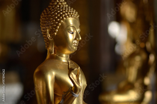 Golden of buddish state in the art style ,Wat Krathum Suea Pla temple ,Bangkok © Art789
