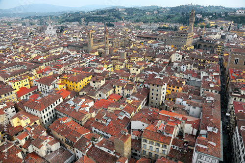 Aerial view of Florence old town from top of Florence Cathedral ( Cathedral of Saint Mary of the Flower ) Panoramic Aerial view from the top of Florence cathedral in Florence Italy ~ 