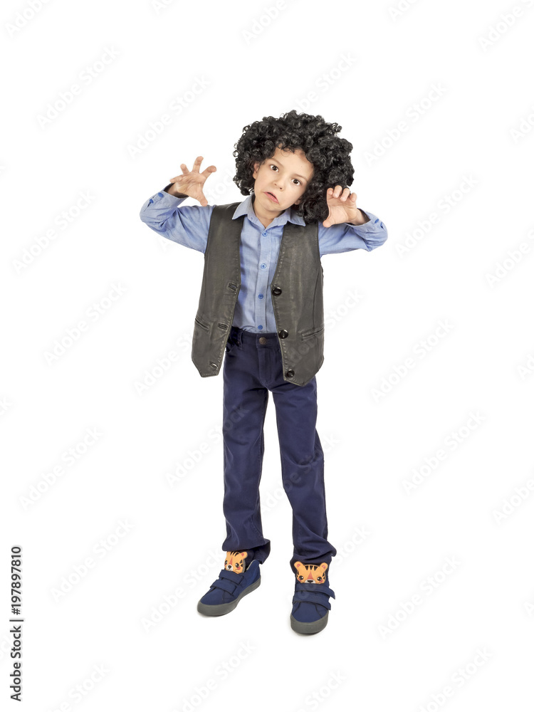 Young boy in afro wig acting like a monster, isolated on white Young boy in afro wig acting like a monster, isolated on white