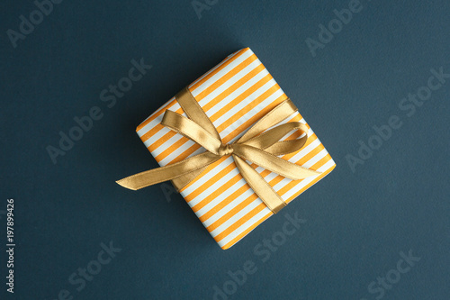 gift on a dark background, top view on a gift box © alexxndr