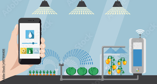 Hand with phone on a background of greenhouse. On the screen condition  measurement tools. Internet of things in agriculture and smart farming
