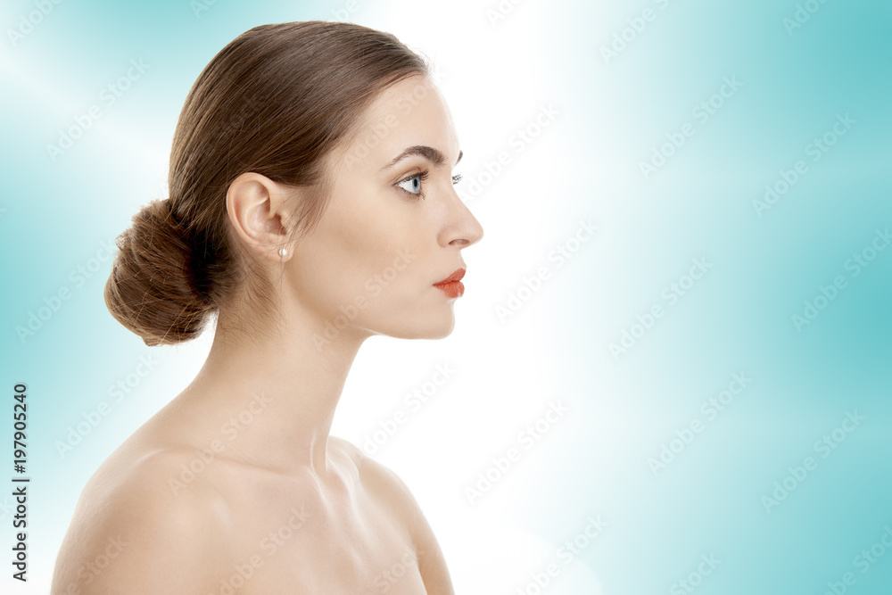Portrait of an attractive young woman with perfect skin, Beauty shot against isolated background Portrait of an attractive young woman with perfect skin, Beauty shot against isolated background