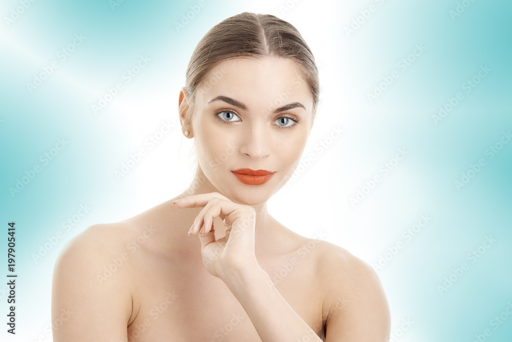Portrait of an attractive young woman with perfect skin, Beauty shot against isolated background Portrait of an attractive young woman with perfect skin, Beauty shot against isolated background