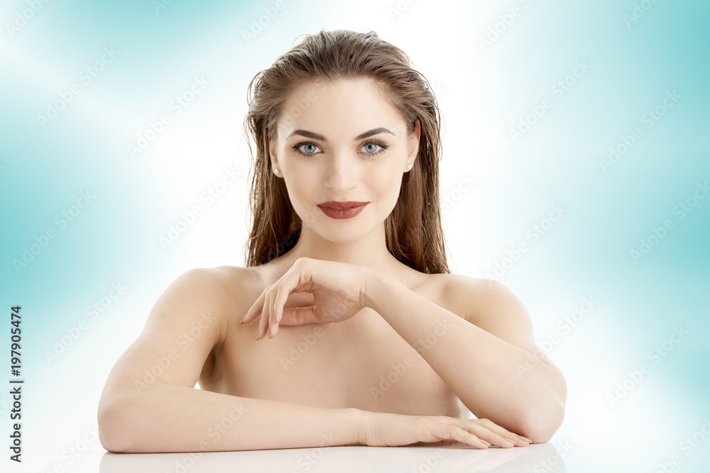 Obraz premium Portrait of an attractive young woman with perfect skin, Beauty shot against isolated background