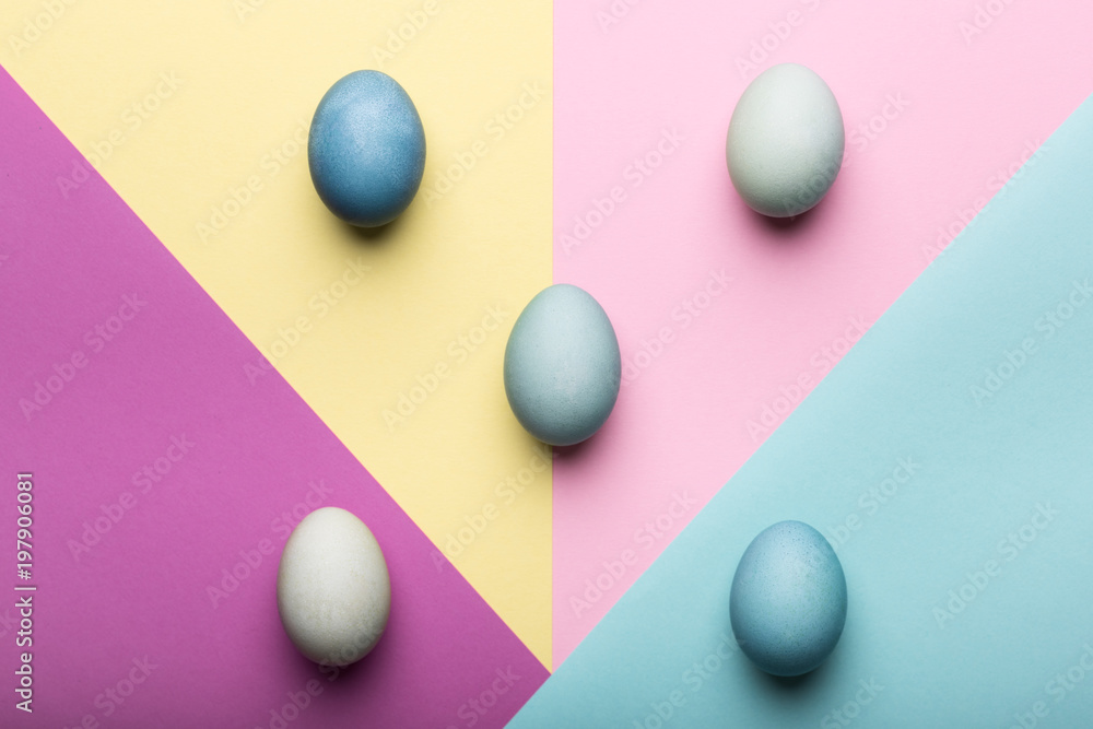 Happy Easter pastel coloured background. Hand painted Easter eggs abstract minimal concept. Happy Easter pastel coloured background. Hand painted Easter eggs abstract minimal concept.
