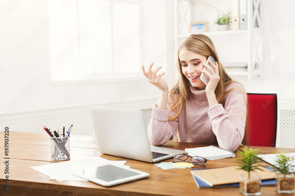 Business talk, woman consulting by phone at office Business talk, woman consulting by phone at office