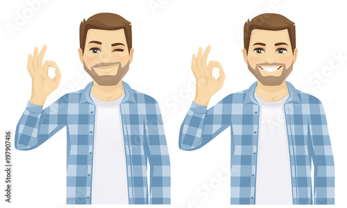 Hansome smiling man showing ok isolated on white background