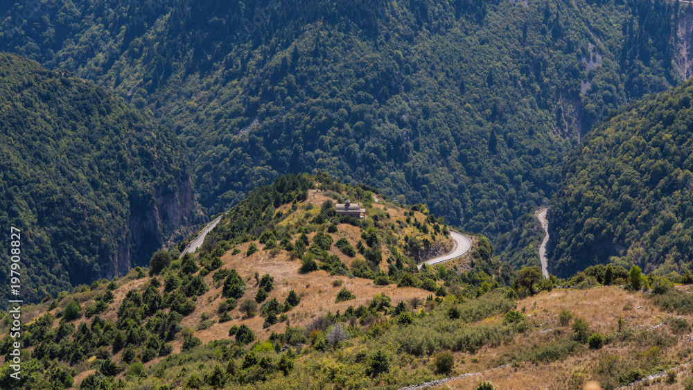 Panoramic view of mountain in National Park of Tzoumerka, Greece Epirus region. Mountain in the clouds Panoramic view of mountain in National Park of Tzoumerka, Greece Epirus region. Mountain in the clouds
