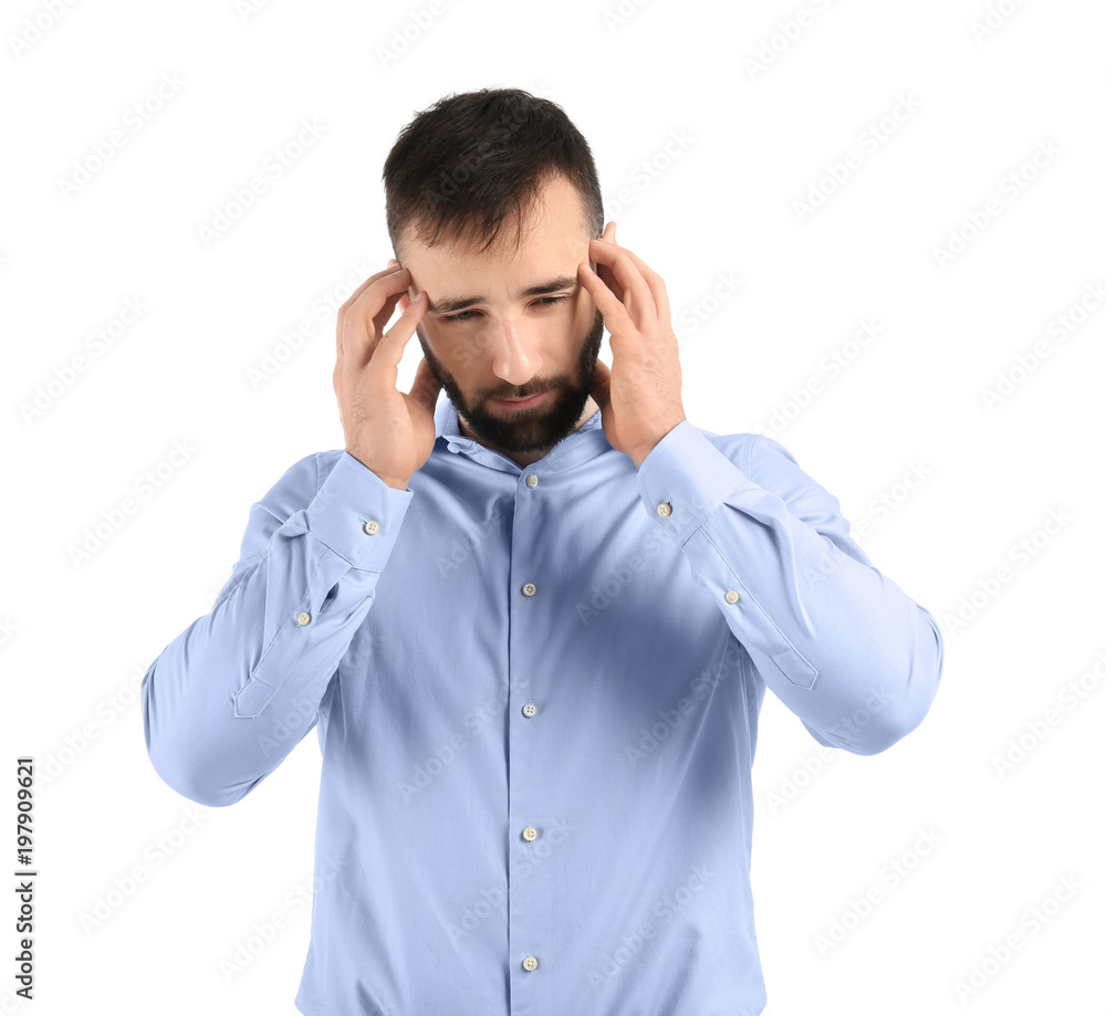 Young man suffering from headache on white background Young man suffering from headache on white background