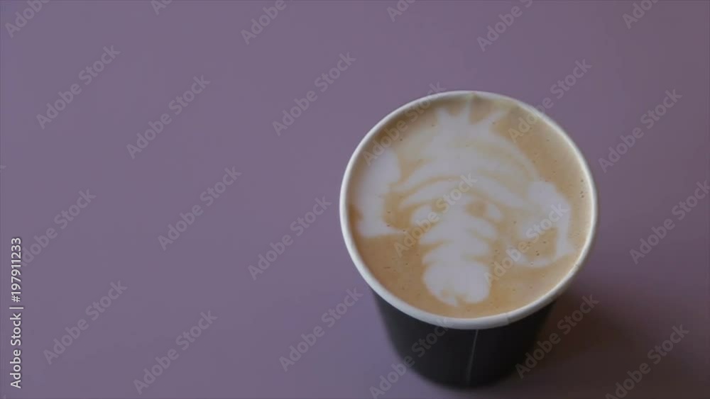 Coffee with whipped cream in a paper cup Coffee with whipped cream in a paper cup