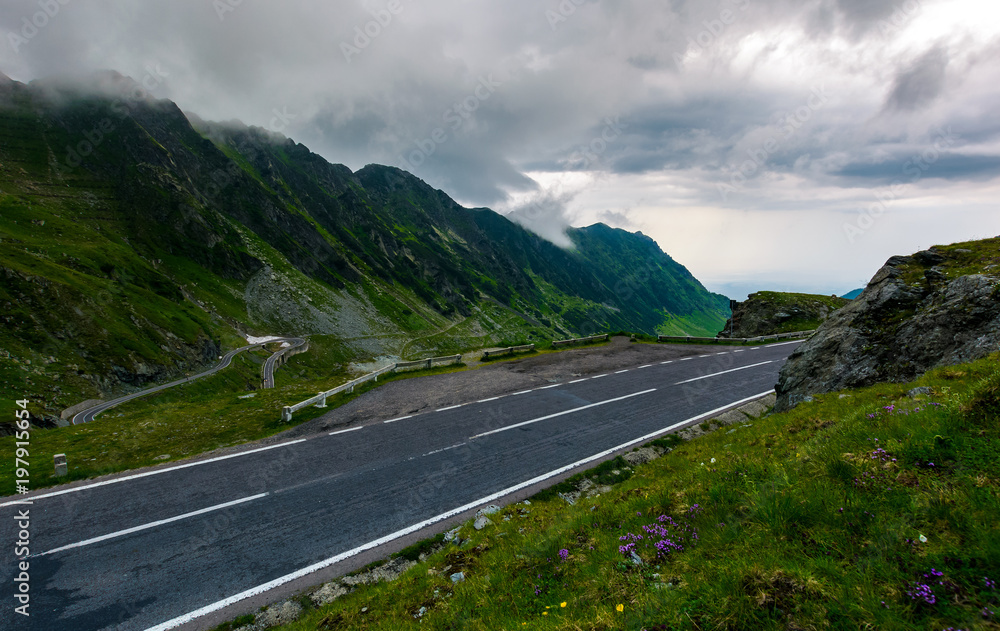 Transfagarasan road on a rainy day. dangerous driving concept. view from the side of the road