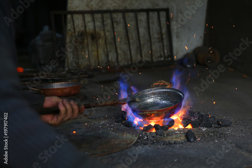 Traditional Turkish tinsmith or coppersmith photo