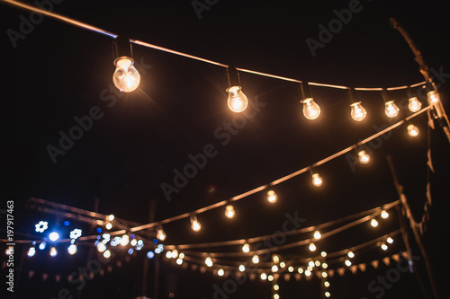 A garland of light bulbs in the decoration of the night ceremony photo