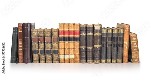 old vintage books in row isolated on white
