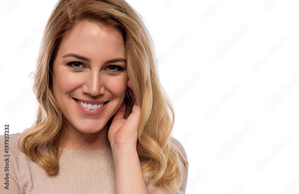 Attractive cute blonde. Close-up portrait on a white. Beautiful young woman in a flesh-colored dress. Attractive cute blonde. Close-up portrait on a white. Beautiful young woman in a flesh-colored dress.