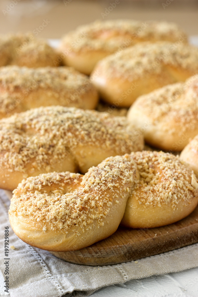 Traditional Romanian and Moldavian sweet buns in the form of eight with honey glaze and nut crumbs. Traditional Romanian and Moldavian sweet buns in the form of eight with honey glaze and nut crumbs.
