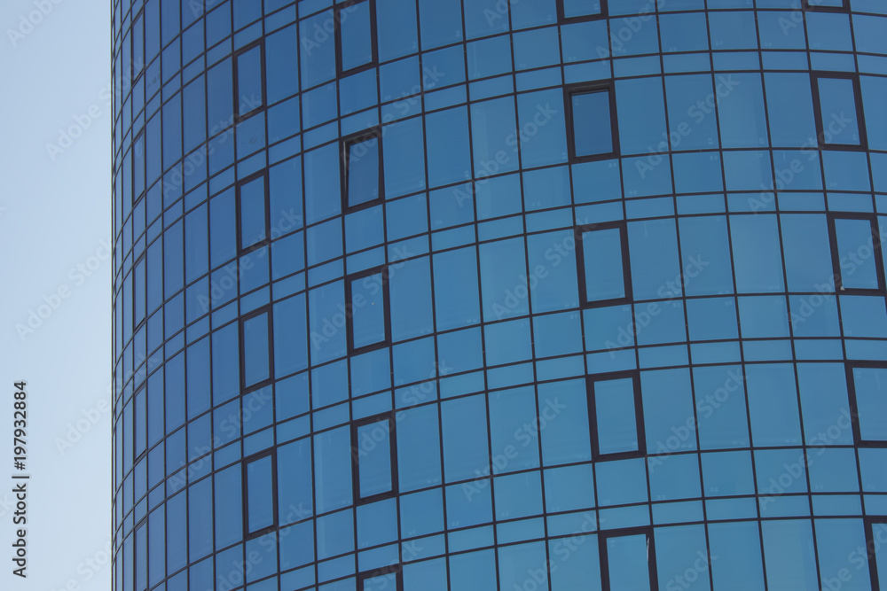 Obraz premium Glass wall of modern building skyscraper