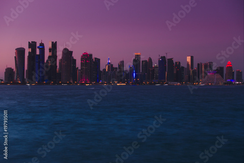 Skyline of West Bay skyscrapers, taken at sunset from the Dhow Harbour. Doha, Qatar.