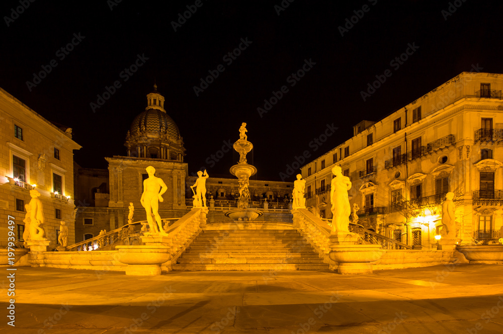 Fountain of shame on  Piazza Pretoria at night, Palermo, Italy