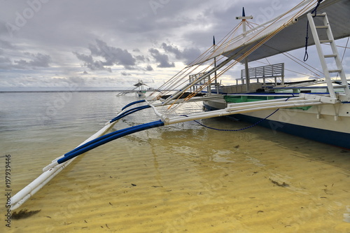 Deck of balangay or bangka boat stranded on Punta Ballo beach-Sipalay-Philippines.0345 photo