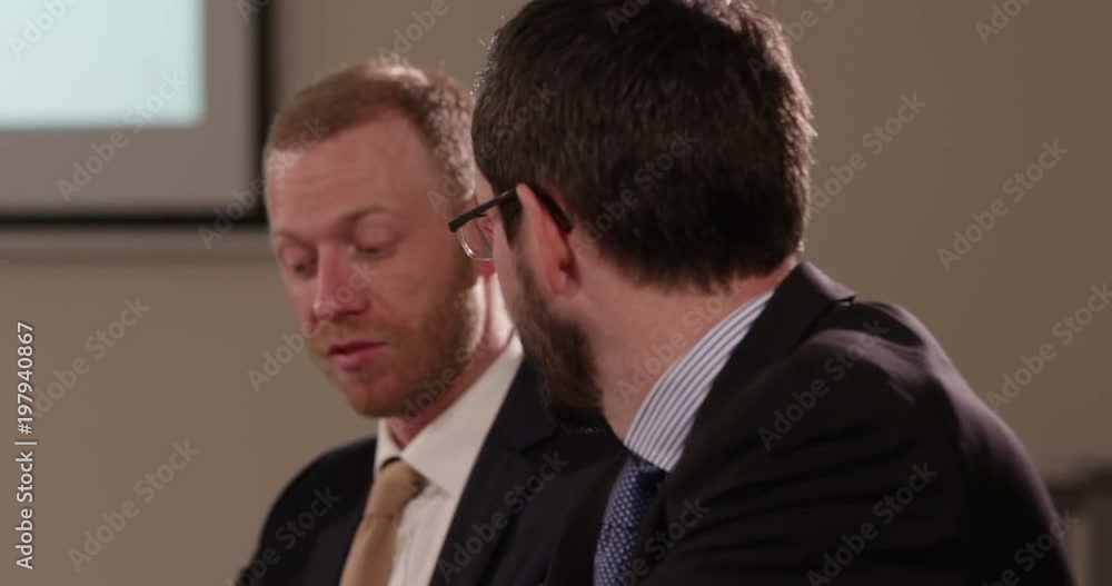 Team of multi ethnic business people in a meeting. Team of multi ethnic business people in a meeting.