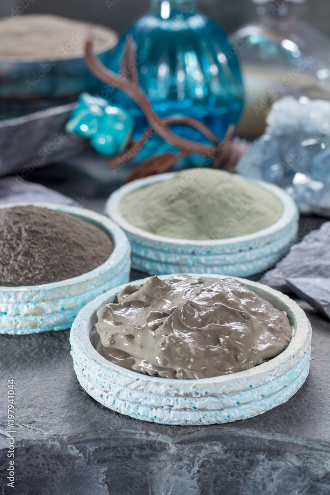 Ancient nature minerals, different types of clay used for skincare, spa treatments, face masks, gray, black, green and blue mud, close up