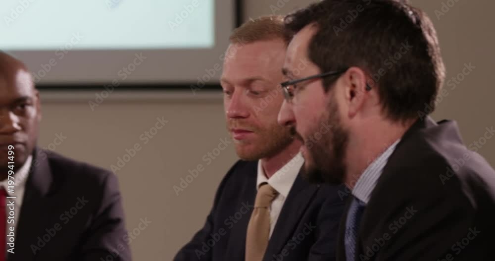 Group of business people during a meeting. Group of business people during a meeting.