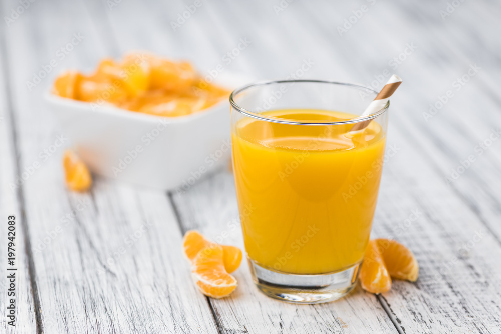 Fresh made Tangerine Juice (close-up shot) Fresh made Tangerine Juice (close-up shot)