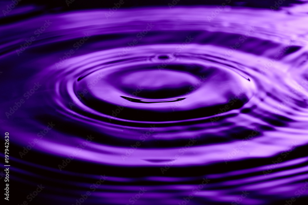Abstract image of water ripples on nice purple ultraviolet colored background Abstract image of water ripples on nice purple ultraviolet colored background