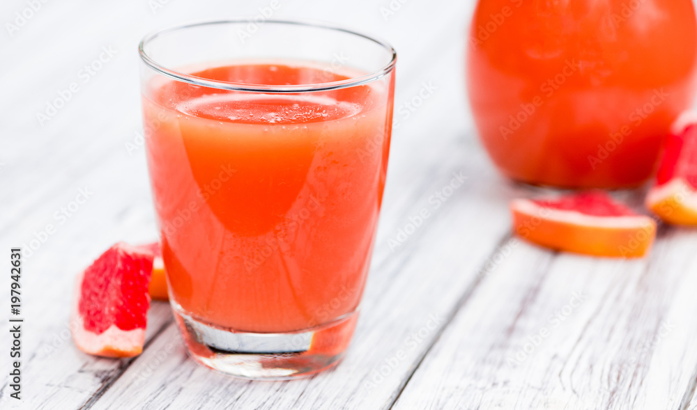 Grapefruit Juice (freshly squeezed, selective focus) Grapefruit Juice (freshly squeezed, selective focus)