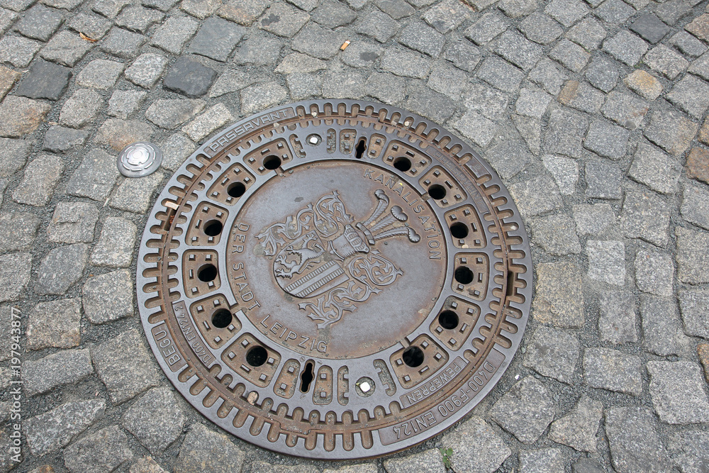 An old sewer manhole cover