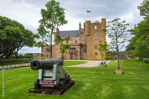 A cannon in front of Castle of Mey, Caithness, Scotland, Britain photo