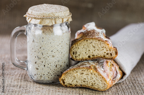 The leaven for bread is active. Starter.sourdough. The concept of a healthy diet photo