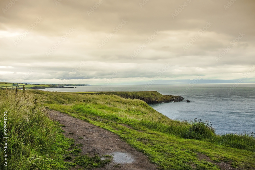 Scotland landscape. Cliffs, rocks and the North Sea with beautiful, dramatic scenery. Stonehaven, Aberdeenshire, Scotland, UK.