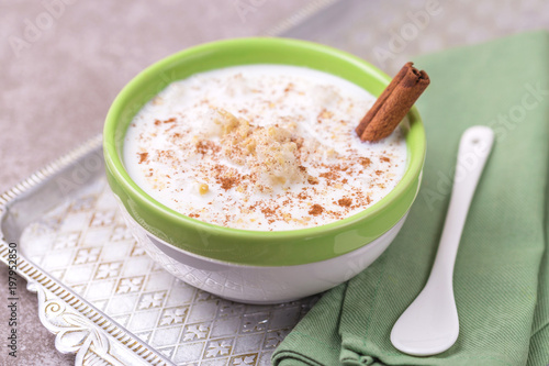 Brazilian winter festival dessert Canjica. White corn porridge photo