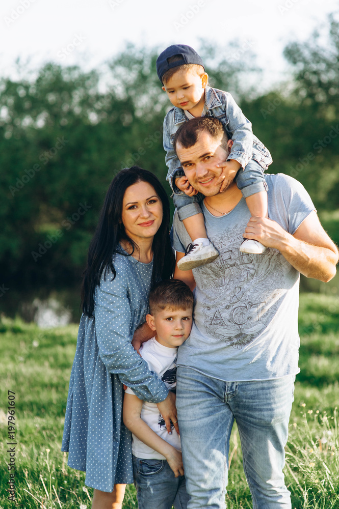 Family Dad Mom and Children in the Field Family Dad Mom and Children in the Field