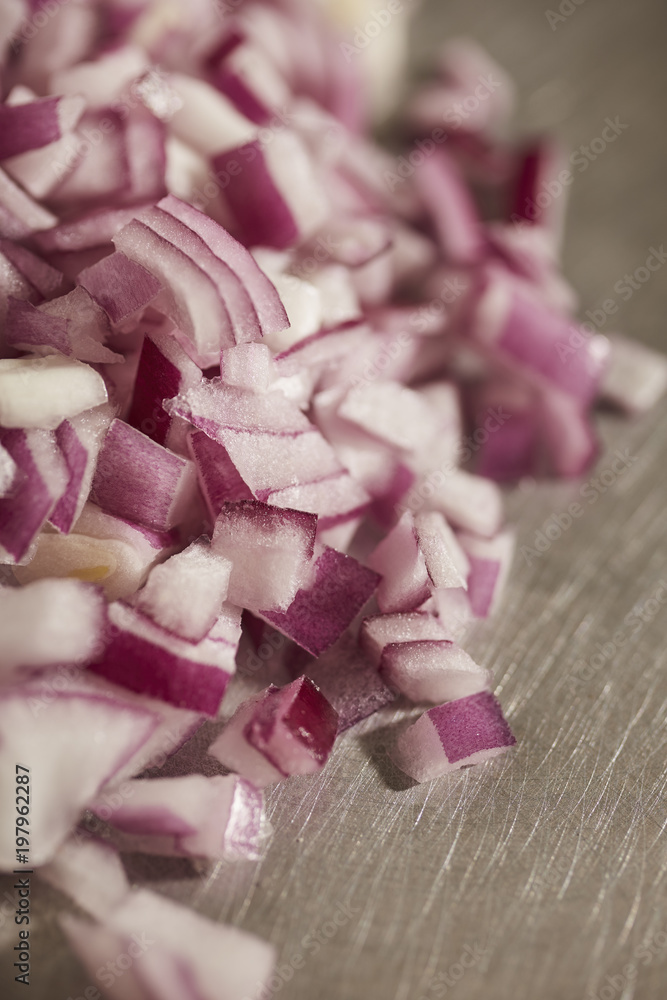chopped bits of Bermuda Onion, sometimes called Red Onion or Bombay Onion chopped bits of Bermuda Onion, sometimes called Red Onion or Bombay Onion