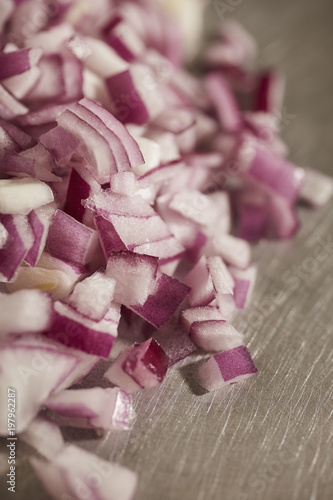 chopped bits of Bermuda Onion, sometimes called Red Onion or Bombay Onion