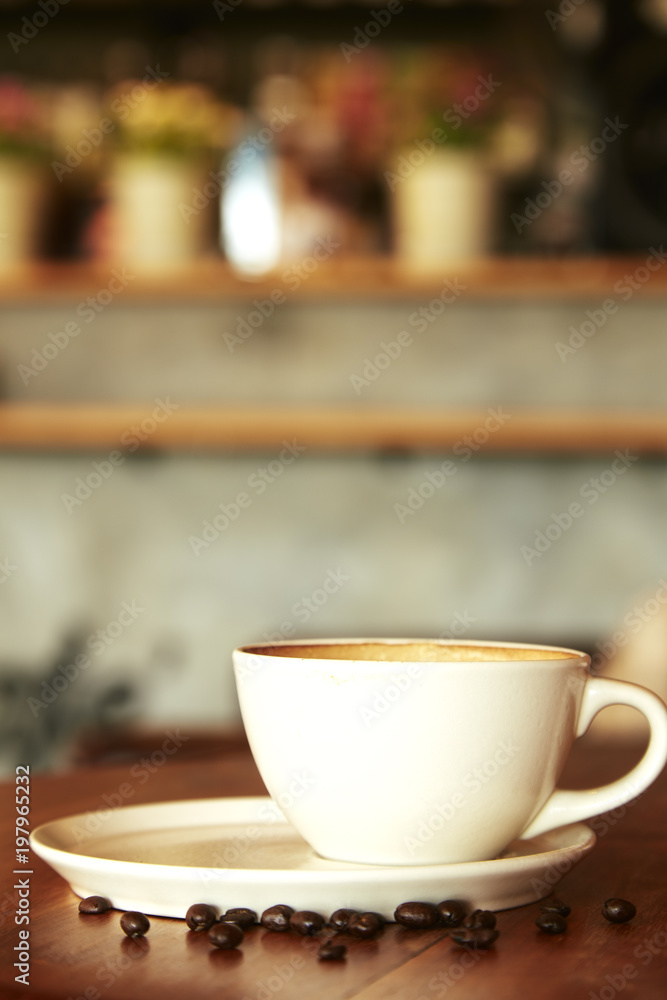 Coffee cup in coffee shop interior Coffee cup in coffee shop interior