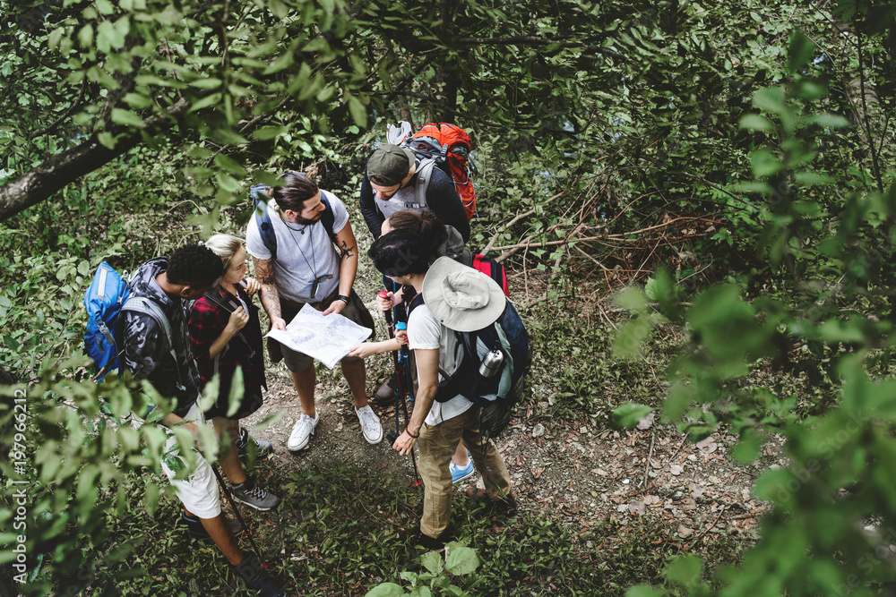 Trekking together in a forest Trekking together in a forest