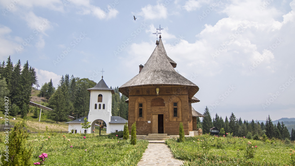 Beautiful Wood Monastery in high Mountains , Moldava Beautiful Wood Monastery in high Mountains , Moldava