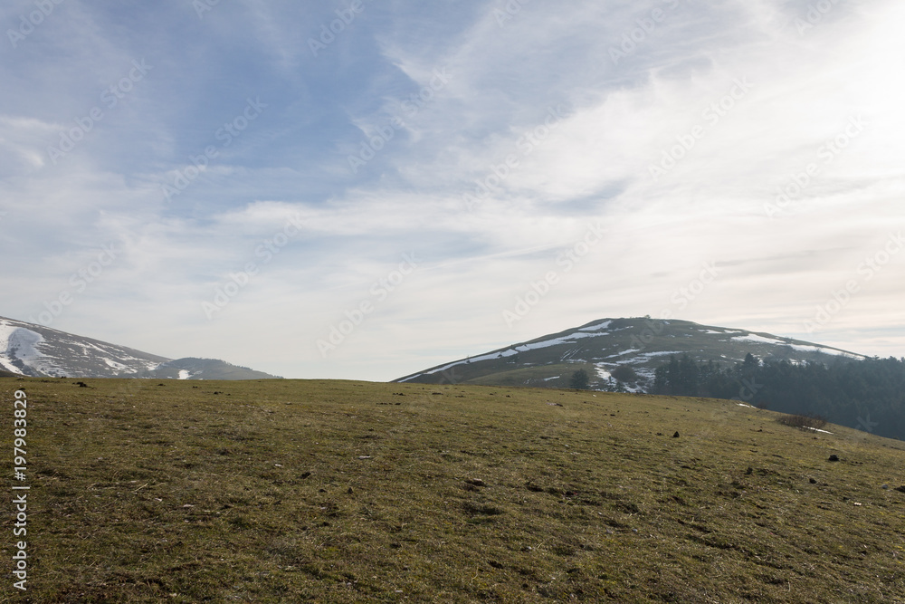 View of Subasio mountain (Umbria) in spring, with melting snow