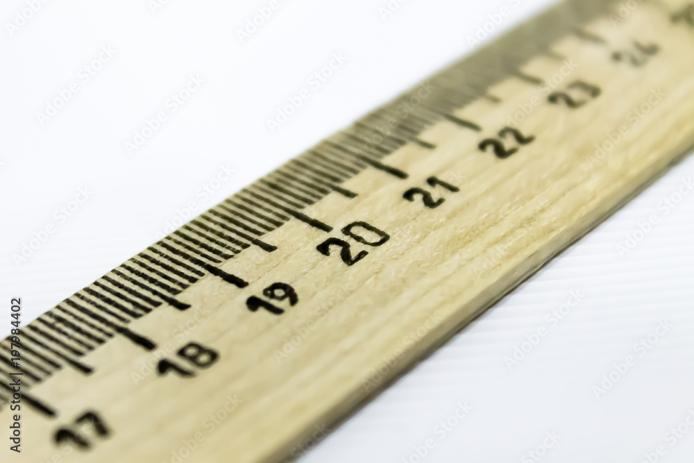 drawing ruler diagonally over white background drawing ruler diagonally over white background