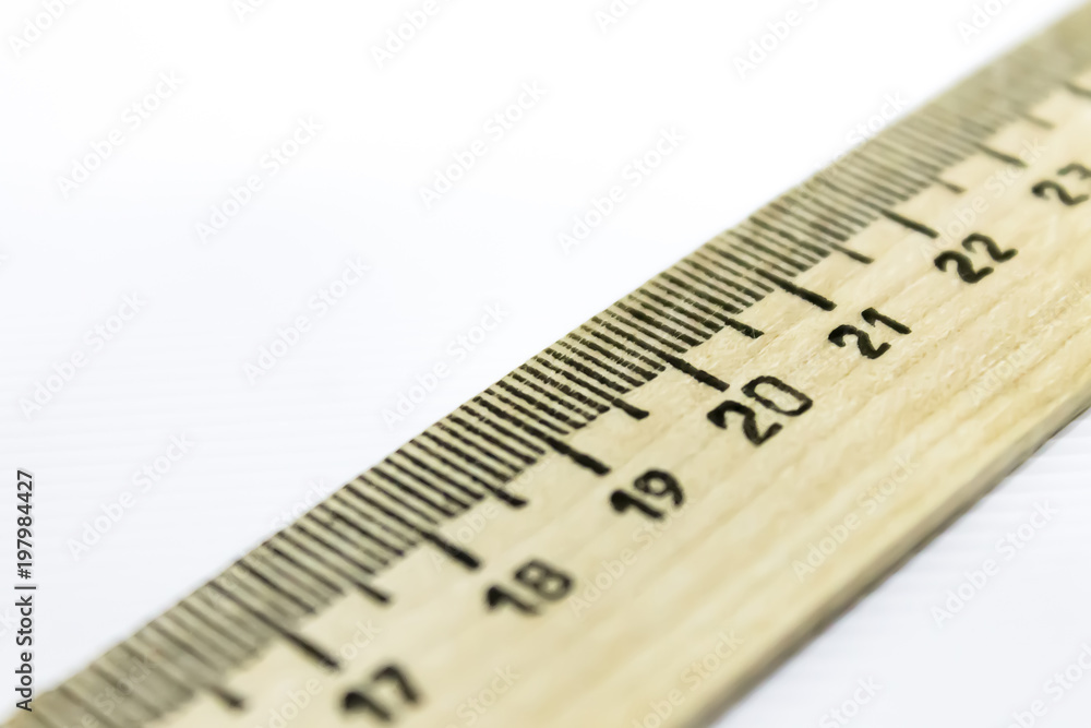 drawing ruler diagonally over white background drawing ruler diagonally over white background